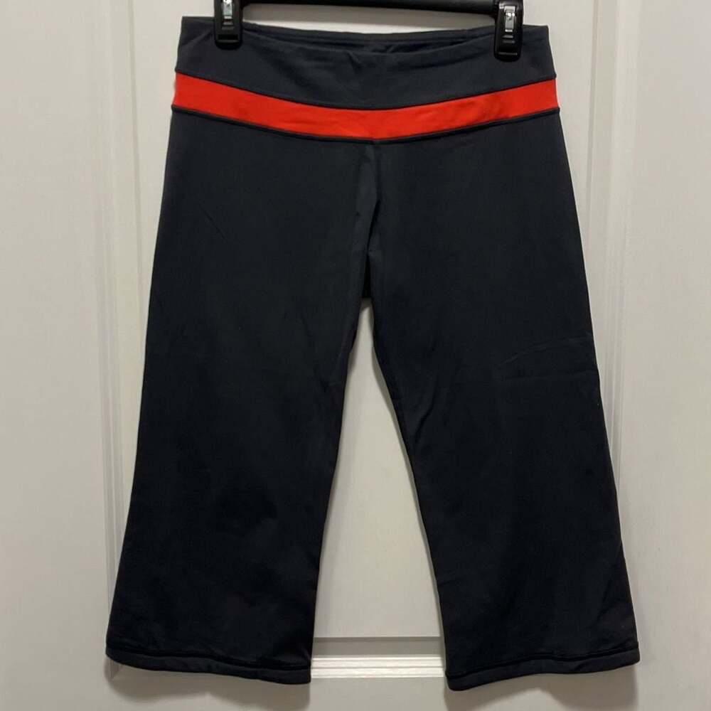 Lululemon Astro Wunder Under Crop Navy with Red Waistband size 8